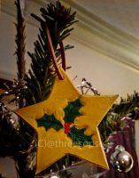hand carved christmas or festive star with ivy leaves